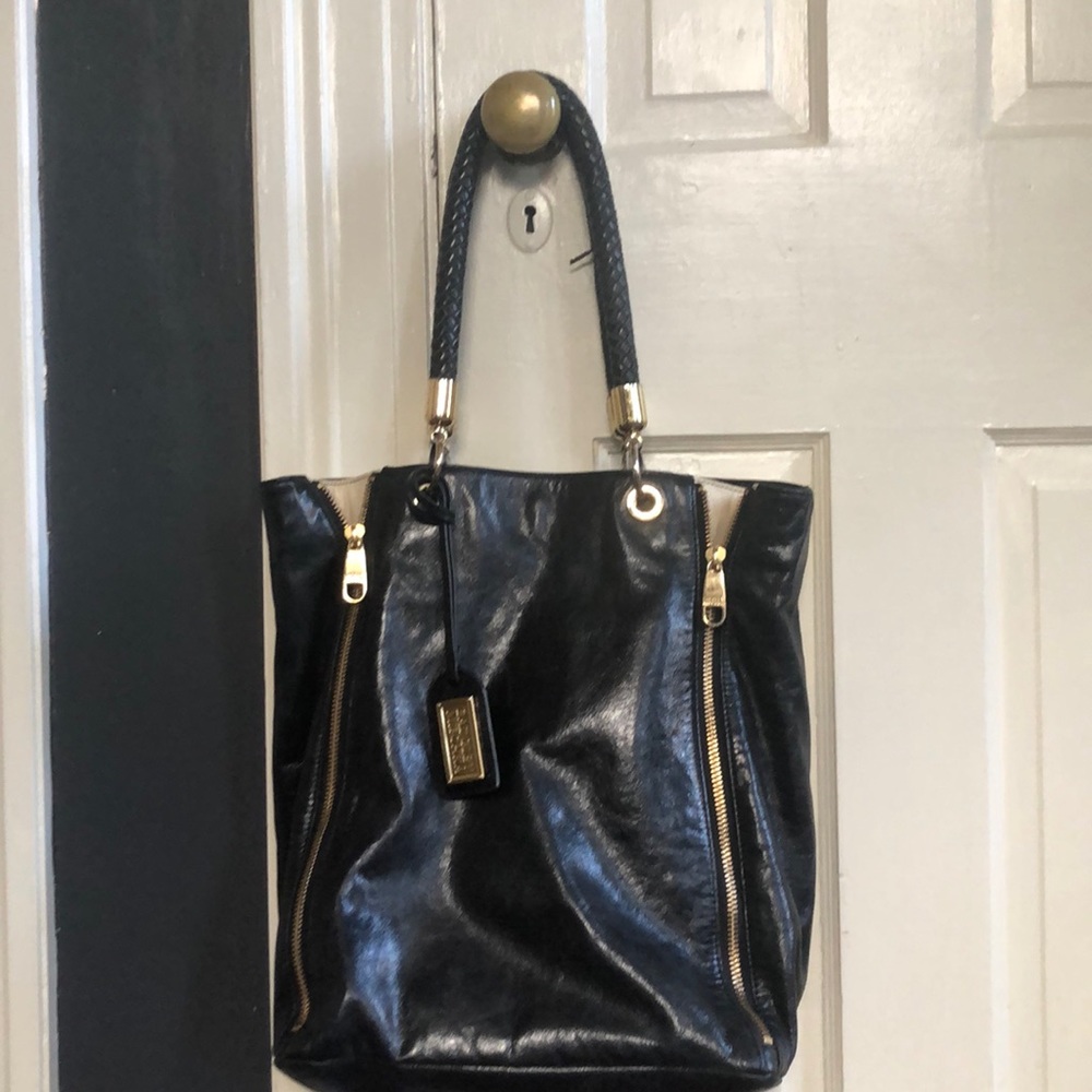 Barely used Badgley Mischka black taupe purse!